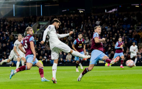 Koleosho in action for Burnley as Fernandes spectacular goal secures Man Utd first away win of the season