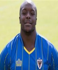 AFC Wimbledon Coach Full Of Praise For His Number Ten Akinfenwa