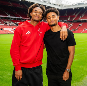 Ex-Leverkusen striker Jordan Zirkzee gives his brother Joshua the thumbs up after Man Utd debut goal 