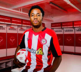 Brentford take up their option to sign Flying Eagles central defender on a permanent deal 