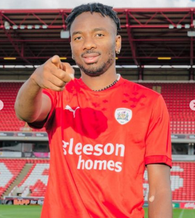 Cut above the rest: Nwakali scores first goal in Barnsley colours but taken off with suspected injury 