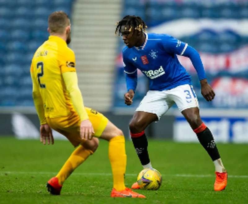 'I was not happy that he left' -Â Van Bronckhorst admits he was sad to see Bassey leave RangersÂ 