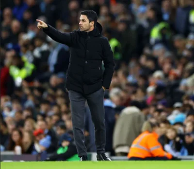 'I was with him for 2 minutes' - Nigerian-born ex-Man City star admits Arsenal bossÂ wasn't cheeryÂ after loss
